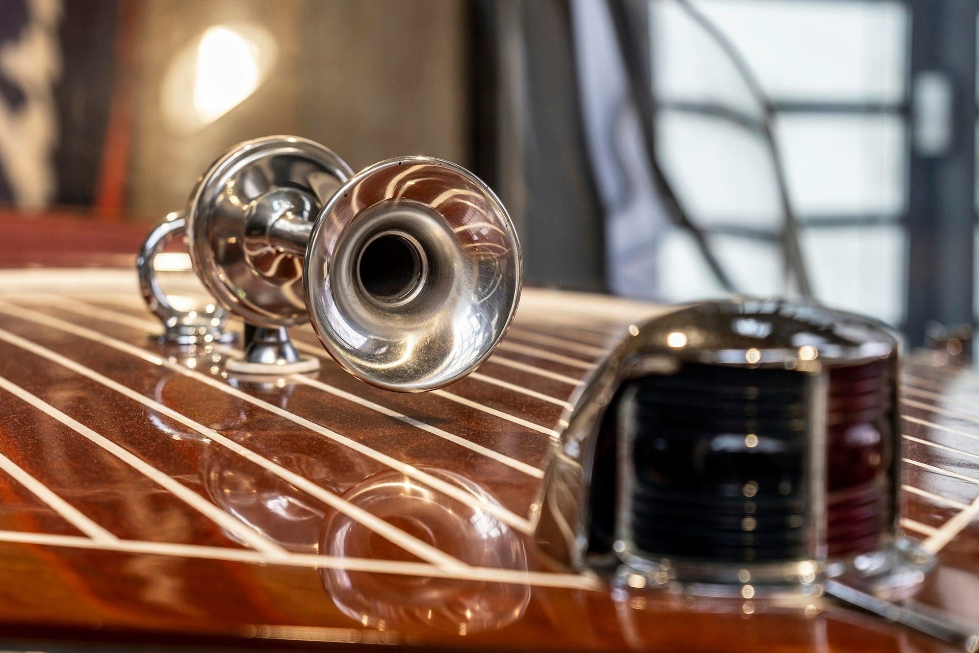 Close-up brass trumpet — steam-era whistle replica style