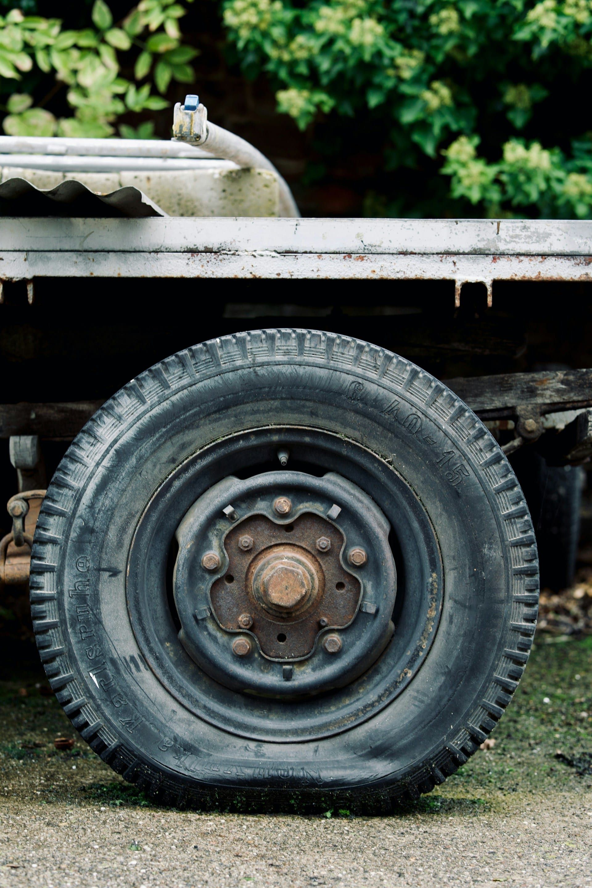Vehicle wheel close-up — spare-tire delete install context